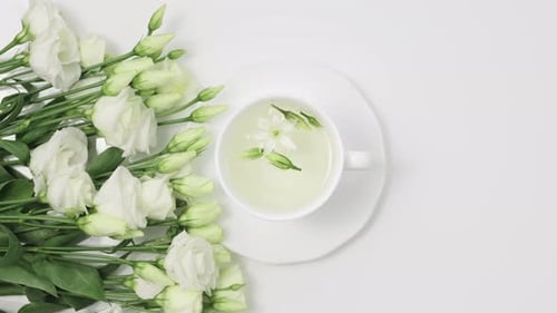 Floral Tea with White Roses and Buds