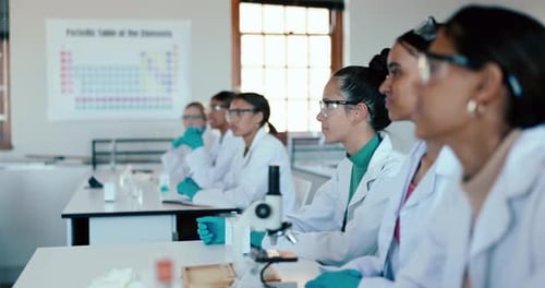 Laboratory, students listening and school for research, future scientist class on college table