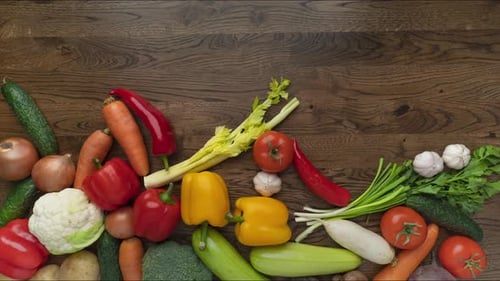 Fresh Vegetables Appear and Clear on Wooden Table