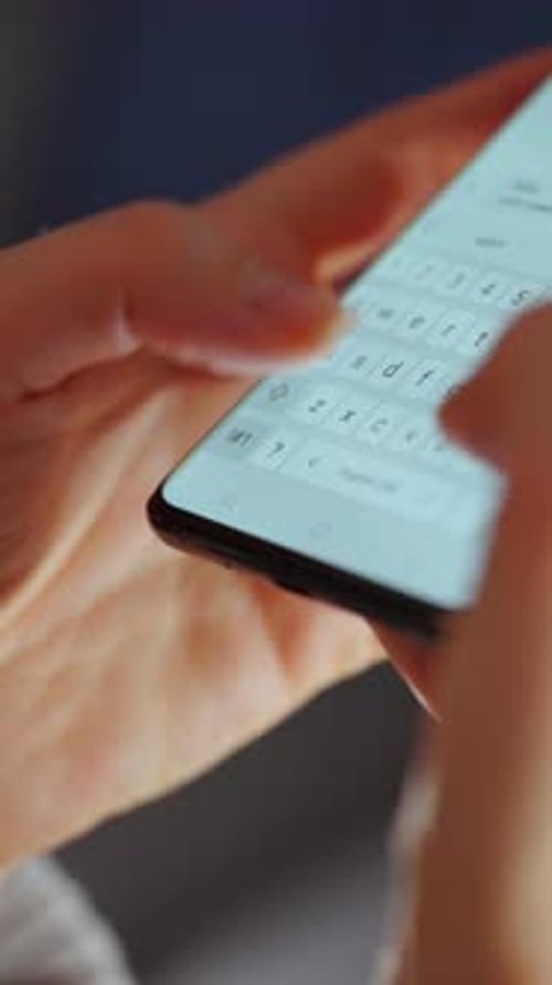 Close-Up of Female Hands Typing on Smartphone