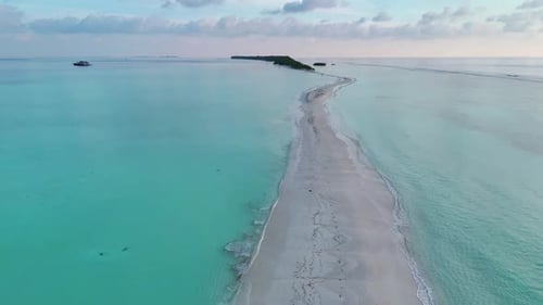 Flight on the infinite sand bank of Dhigurah in the Maldives