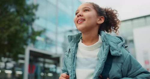 Education, kid and girl with backpack or happy at school in outdoor with learning in elementary