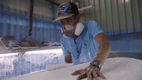 Surfboard Shaping Process in Workshop with Skilled Craftsman