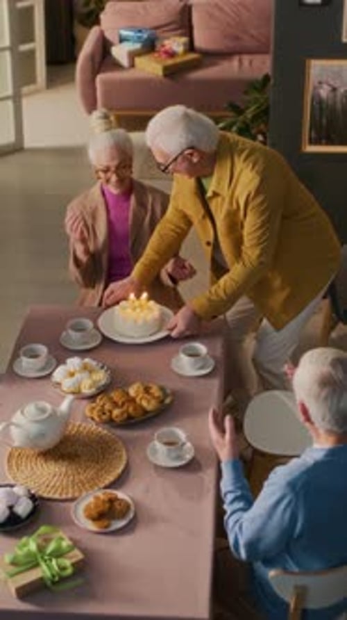 Seniors Celebrate Birthday with Cake and Gifts