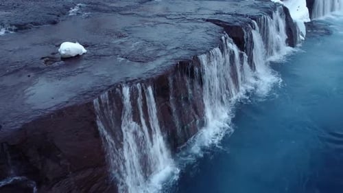 Waterfall in Iceland Snowy Ice Mountain River in Winter Nature