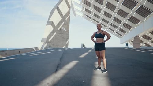 shaved woman making sport outdoor