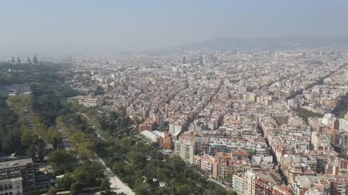 Aerial video above the buildings of the city of Barcelona, Europe