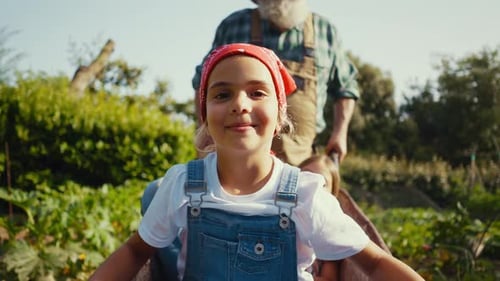 Family having fun in the vegetable garden