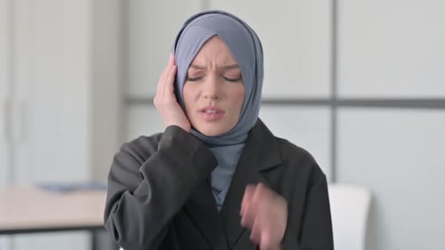 Portrait of Tired Muslim Businesswoman with Headache