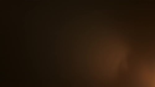 The Frame Depicts an Abstract on a Black Background Isolated Fire Glare Moves in the Frame
