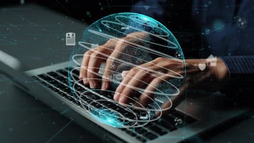 Typing on Laptop with Abstract Globe Overlay