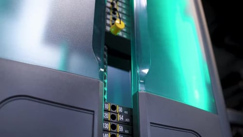 Process of Lifting Weight Plates and Blocks on Rack Machine Training on Block Device and Gym