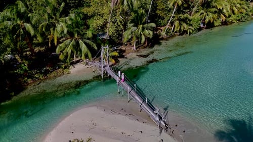 Serene Tropical Escape in Koh Kood Thailand Featuring a Tranquil Wooden Bridge