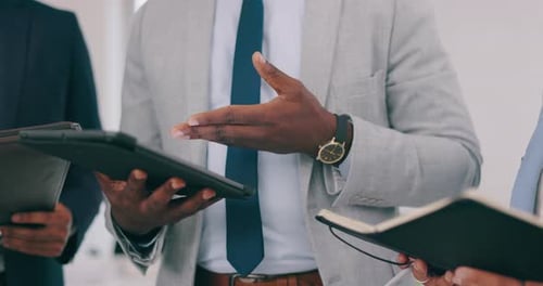 Suited Adults Holding a Corporate Meeting