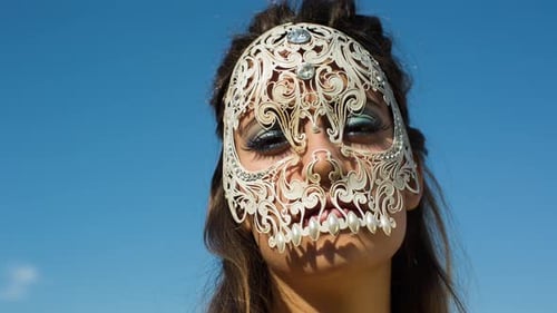 A Woman with Venetian Skull Mask