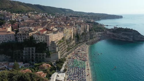 Aerial View of Touristic Historic Center of Tropea Town Cliffs and Sandy Beach on Sunny Summer Day