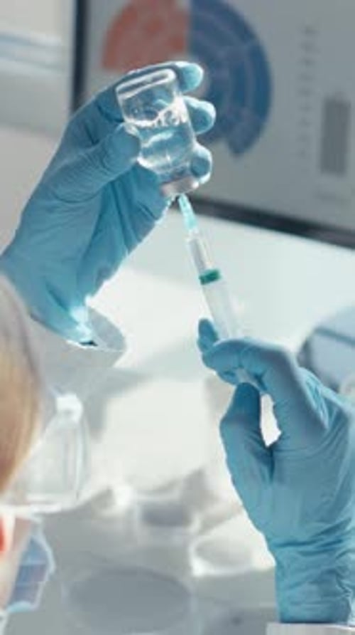 In the Laboratory a Scientist Demonstrates Precision in Biochemistry and Biology Research By