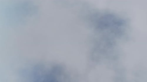 Smooth Flight Through Dynamic White Clouds Animation