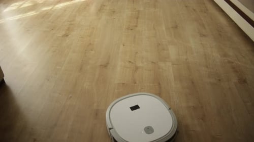 Robot Vacuum Cleans Wooden Floor