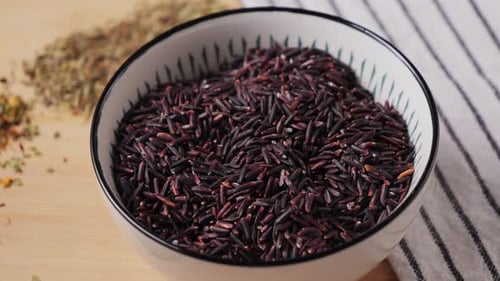 Bowl Full of Dark Rice and Herbs