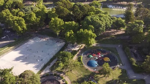 Kids playing at Centenario park of Buenos Aires. Aerial circling