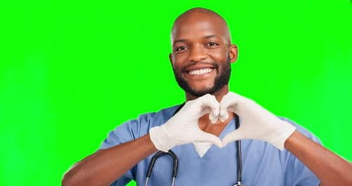 Heart sign, green screen doctor or happy man with love gesture for healthcare