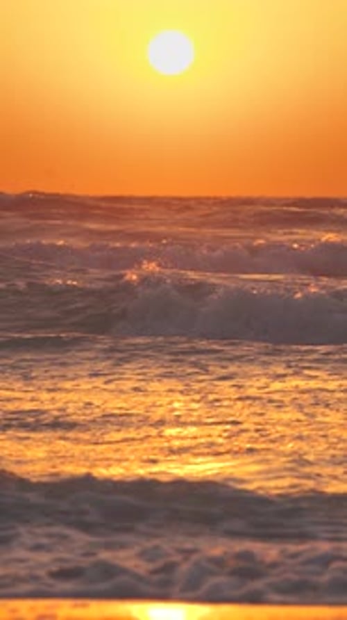 Vertical Shot Sun Shine Above Sea Ocean During Sunset