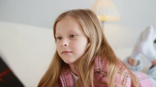 Closeup of Girl Reading Handheld Camera Movement