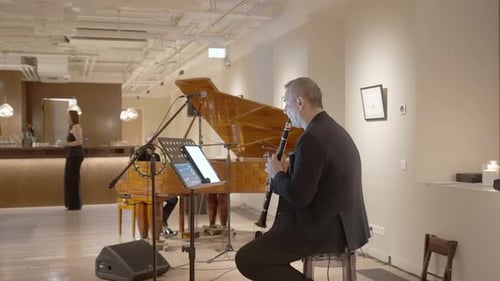 Clarinet and piano musical performance in restaurant