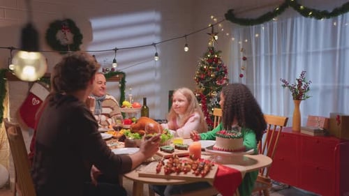Family Celebrates Christmas Together at Home