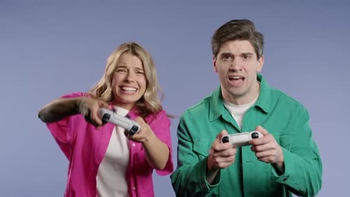 Excited Couple Plays Video Games Together