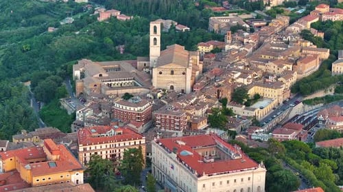 Establishing Aerial View of Perugia City Skyline at Sunset Golden Hour Italy