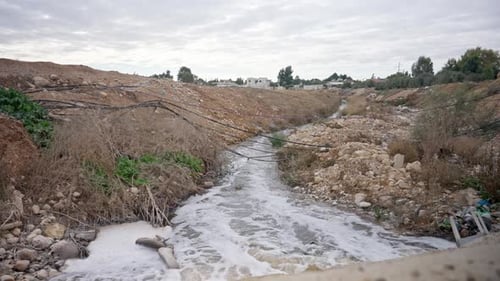 Polluted water stream Bedouin village