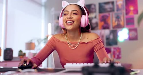 Woman Playing Computer Game Smiling