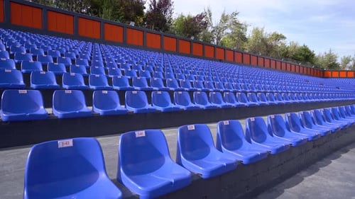 Empty blue seats in the stadium 4K