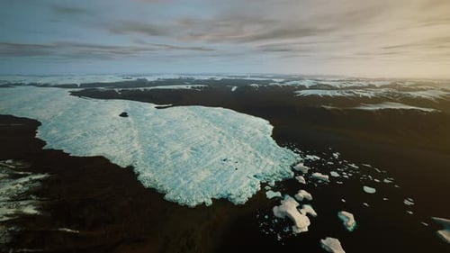 Aerial View of Arctic Glacier Melting into Ocean with Icebergs