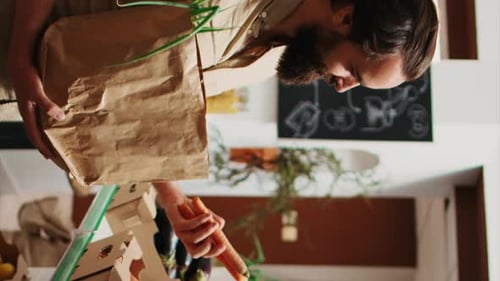 Man shops for fresh produce at local store