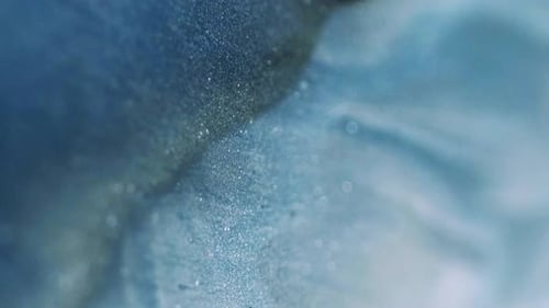 Abstract Liquid with Glittering Particles