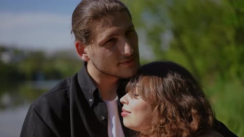 Loving Couple Embracing in a Natural Setting