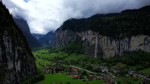 4k Drone Aerial Shot Of Famous Staubbach Waterfall In Lauterbrunnen Village With Impressive Vast Gla