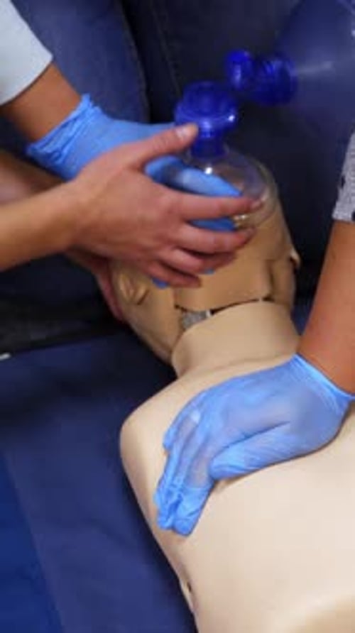 CPR Training on Medical Dummy with Gloves