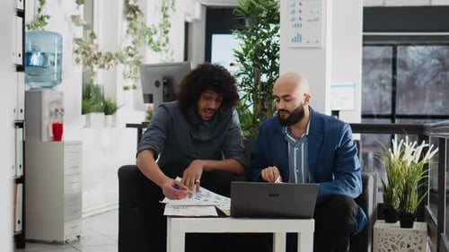 Two Men Meeting in Corporate Office