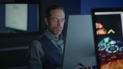 A Focused and Dedicated Professional Specializing in Analyzing Data in a Modern Office Setting