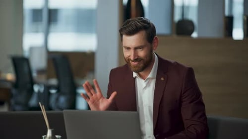 Cheerful Man Greeting Hand Video Chat Using Modern Laptop at Office Desk Closeup
