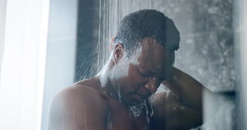 Man Washing in a Modern Shower