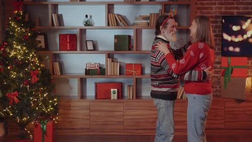 Senior Couple Dancing Joyfully at Christmas