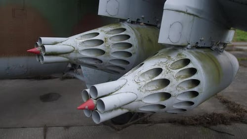 Moss Covered Rocket Pods Under Wing Salvage Technician Documents Corroded Launcher Surfaces with