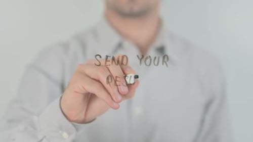 Man Writing Send Your Resume on Glass