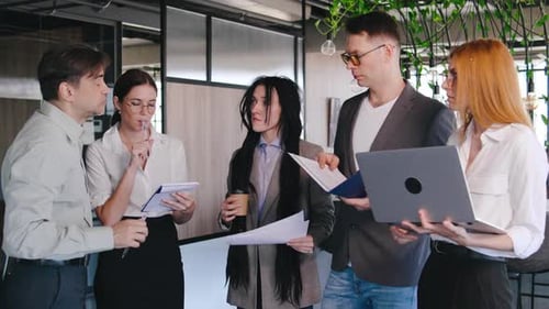 Business Team Collaborates in Modern Office Space