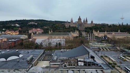 Barcelona with national art museum in the background, overcast day, aerial view